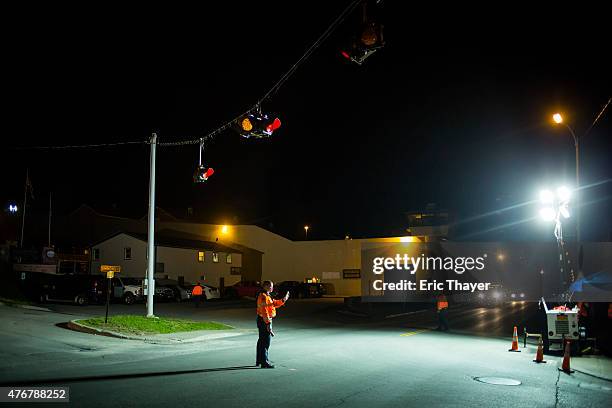 Police work a roadblock at the Clinton Correctional Facility on June 11, 2015 in Dannemora, New York. Law enforcement continue their search for two...