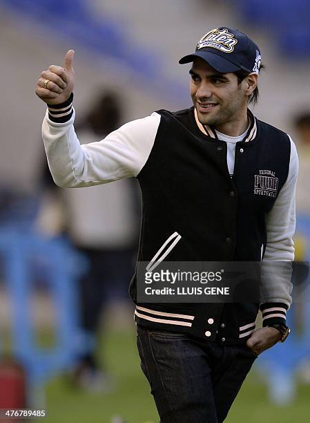 Colombian football player Radamel Falcao gives the thumbs up before the FIFA 2014 World Cup friendly football match Colombia vs Tunisia at the...