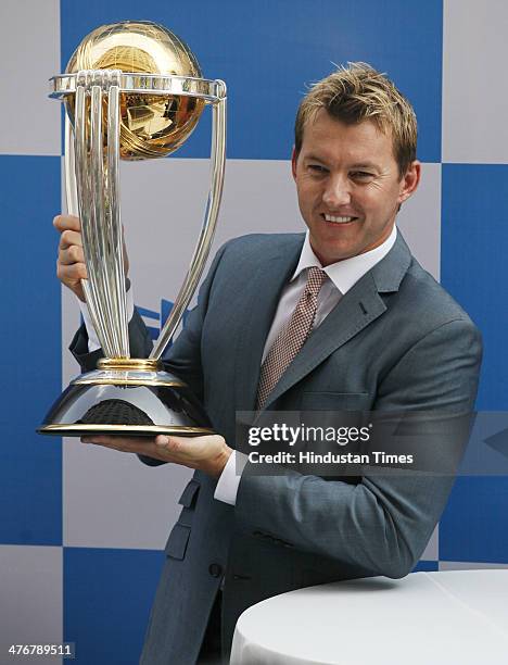 Former Australian cricketer Brett Lee unveiling Cricket World Cup 2015 Trophy, during the press conference to launch the travel package program to be...
