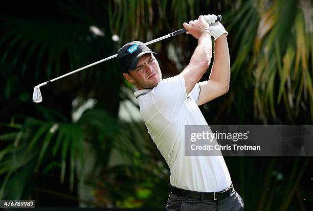 Martin Kaymer of Germany hits a shot during a practice round prior to the start of the World Golf Championships-Cadillac Championship at Trump...