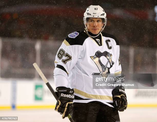 Sidney Crosby of the Pittsburgh Penguins skates against the Chicago Blackhawks during the 2014 NHL Stadium Series game on March 1, 2014 at Soldier...