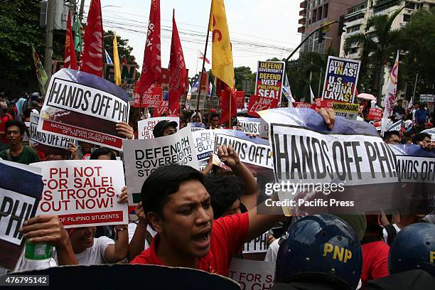 Bayan Youth chair Vencer Crisostomo , leads the call for the U.S. To leave the Philippines. There are about one thousand protesters marched to the...