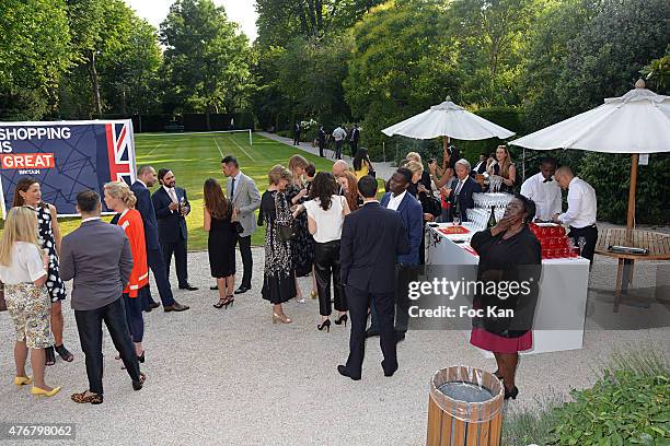 General view of atmosphere during the British 'Summer Time 2015' cocktail at the British Embassy and shops events Rue du Faubourg Saint Honore on...
