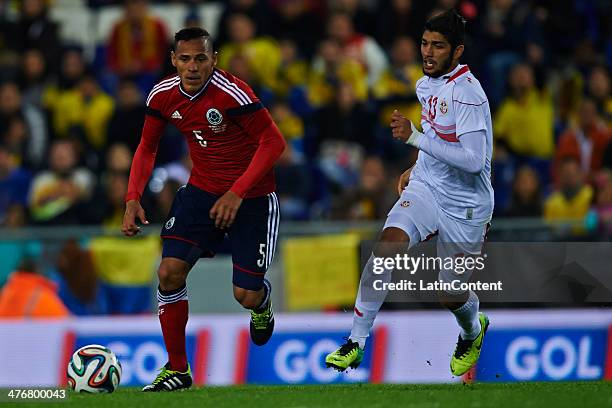 Aldo Leao Ramirez of Colombia and Mehdi Nafti of Tunez during the International friendly match between Colombia and Tunisia at Cornella el Prat...