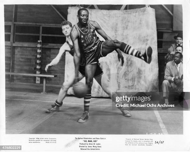 Reese "Goose" Tatum of the Harlem Globetrotters dribbles the ball during the motion picture "Go, Man Go!" circa 1954.
