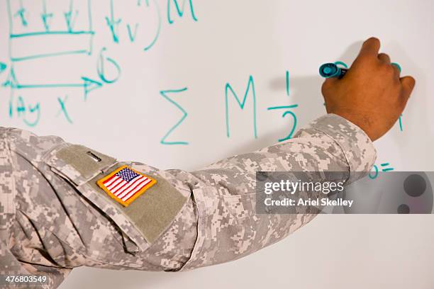 black soldier writing on whiteboard - demonstration in defense of wolf conservation in madrid stockfoto's en -beelden