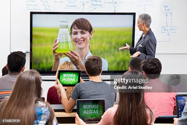 professor and scientist teaching via video conference - zoom classroom stock pictures, royalty-free photos & images