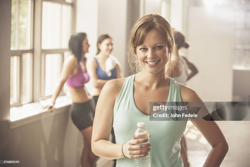 Woman smiling in gym