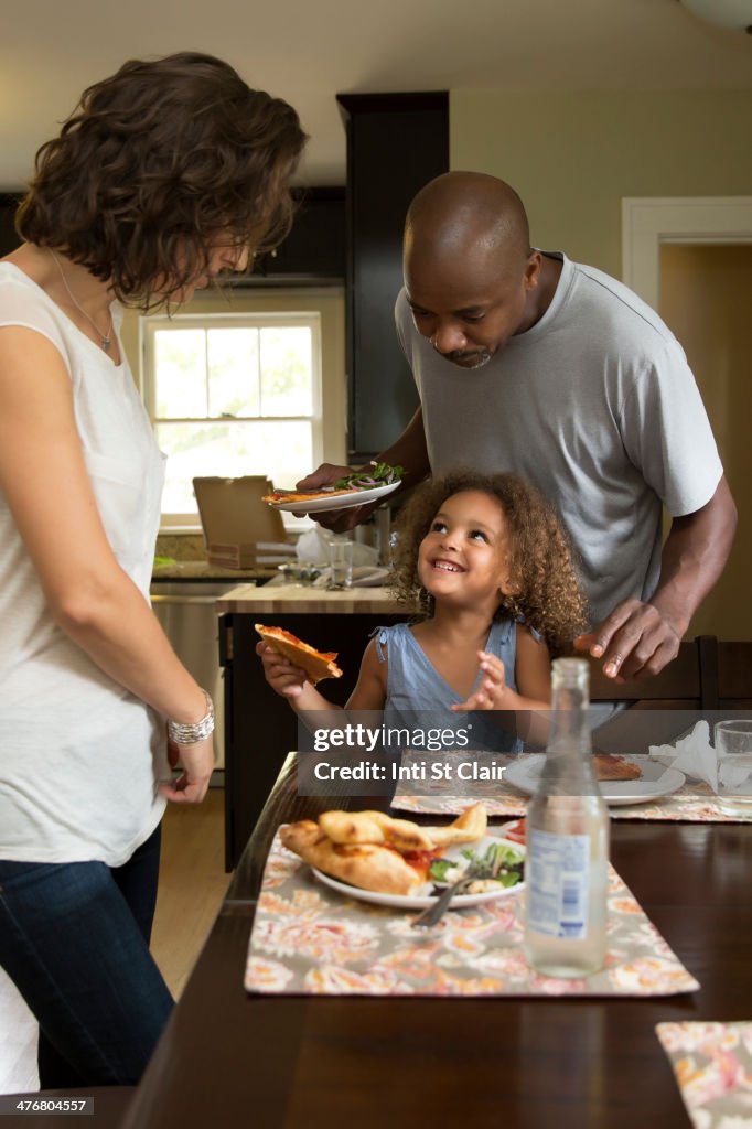 Family eating together at table