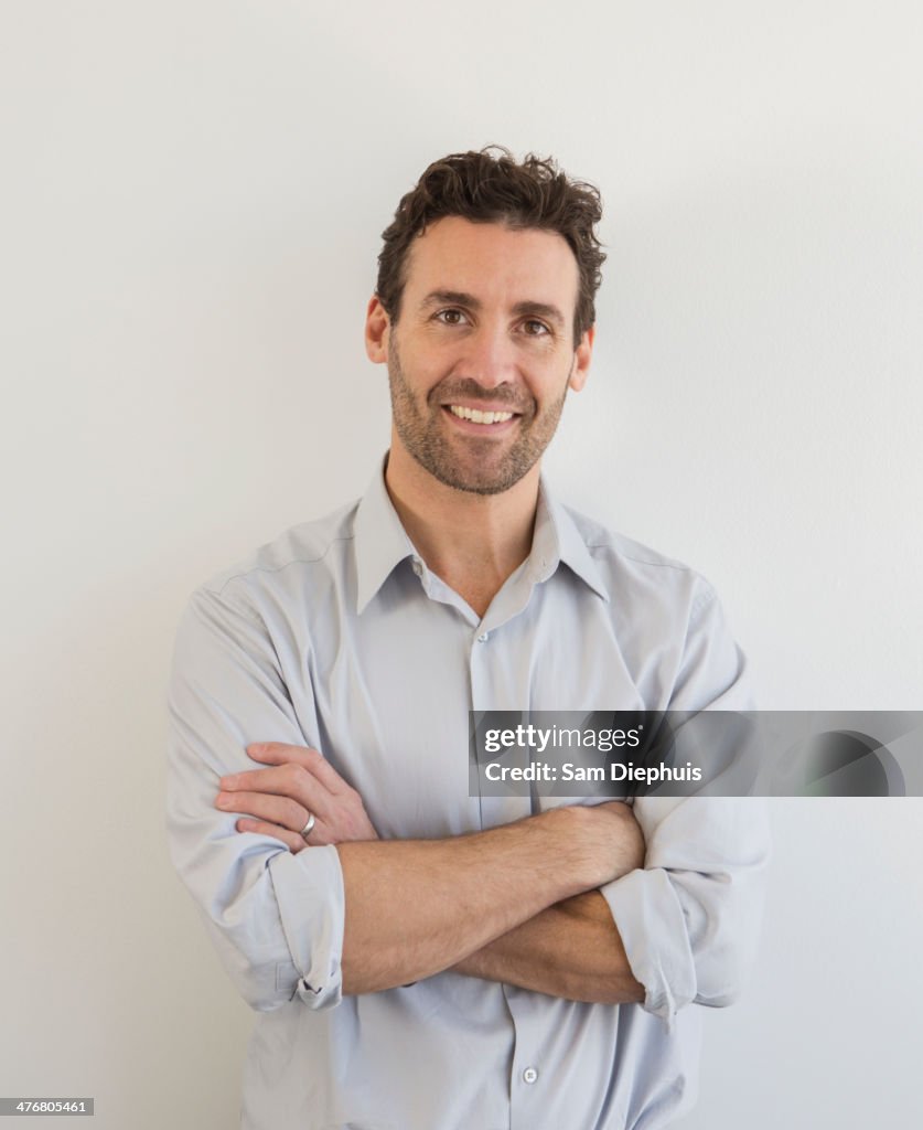 Hispanic businessman smiling