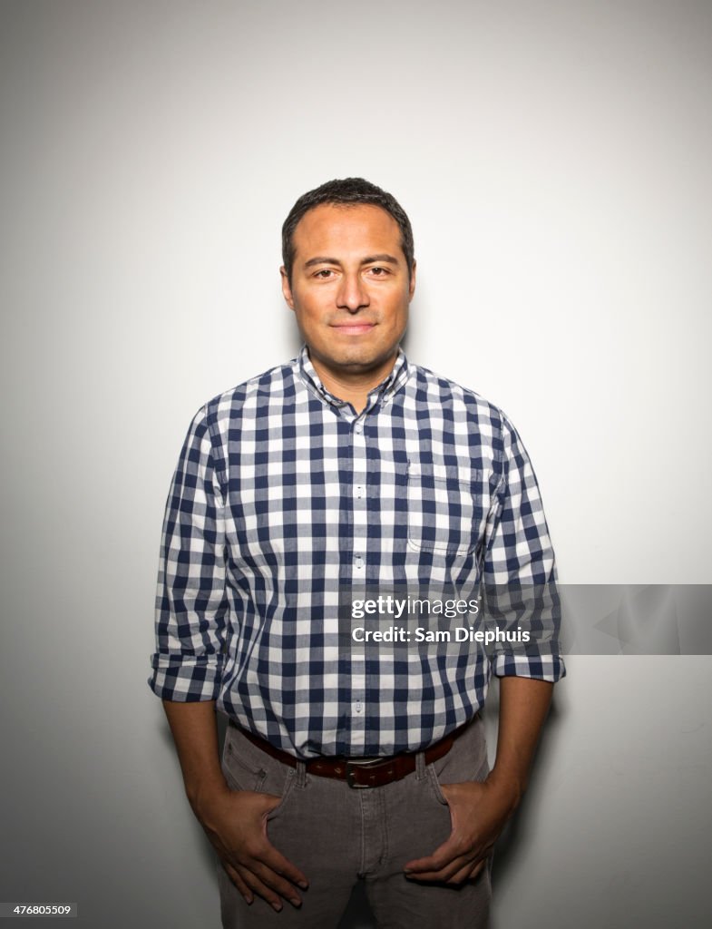 Hispanic businessman smiling