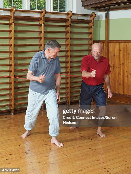 men working out together in gym - bare feet on hardwood stock pictures, royalty-free photos & images