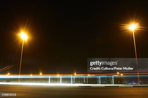 time lapse view of traffic at night - traffic time lapse stock pictures, royalty-free photos & images