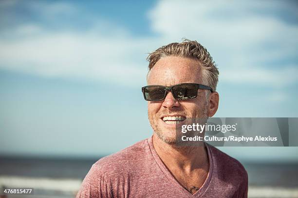 portrait of man wearing sunglasses - jacksonville beach stock pictures, royalty-free photos & images