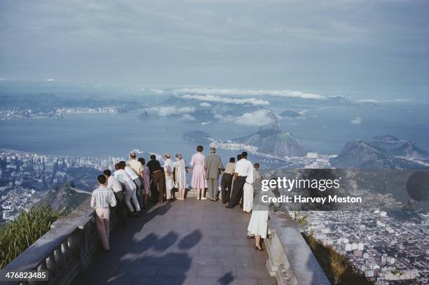 The view from the Corcovado mountain over Rio de Janeiro, Brazil, with Sugarloaf Mountain in the centre right, circa 1960.