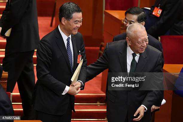 Leung Chun-ying , the current chief executive of Hong Kong, and Tung Chee Hua , former chief executive of Hong Kong, attends the opening session of...