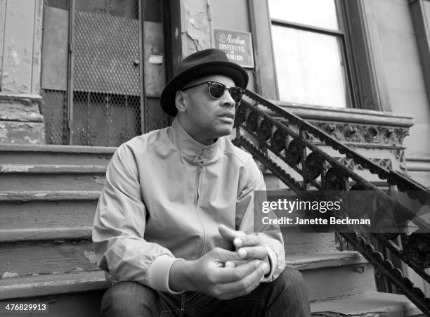 Portrait of DJ Nature as he sits on a stoop in Harlem, New York, New York, December 11, 2012.