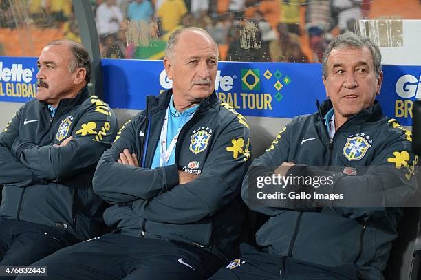 Brazil's assistant coach Flavio Murtosa , Brazil's coach Luiz Felipe Scolari and Brazil's technical coordinator Carlos Alberto Parreira look on...