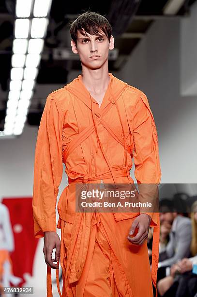 Model walks the runway at the Craig Green show during The London Collections Men SS16 at Victoria House on June 12, 2015 in London, England.