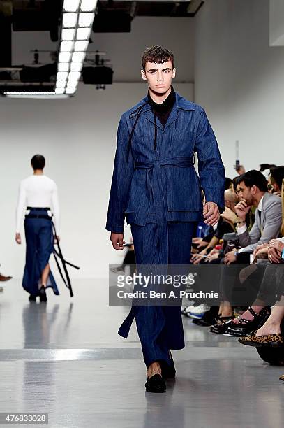 Models walk the runway at the Craig Green show during The London Collections Men SS16 at Victoria House on June 12, 2015 in London, England.