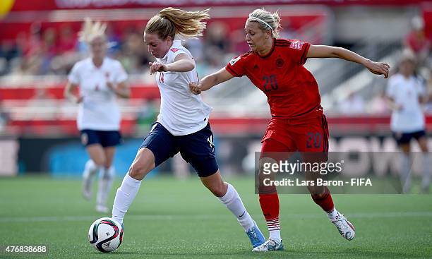 Ingrid Schjelderup of Norway is challenged by Lena Goessling of Germany during the FIFA Women's World Cup 2015 Group B match between Germany and...