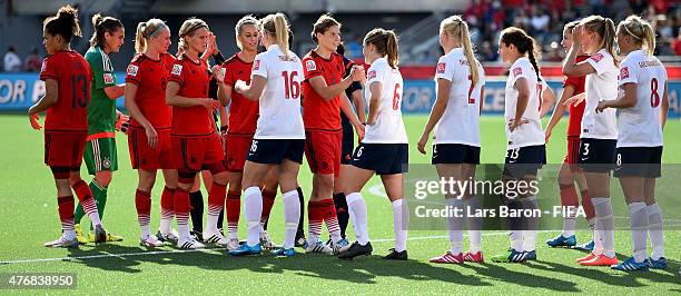 Players of Germany and Norway shake hands after the FIFA Women's World Cup 2015 Group B match between Germany and Norway at Lansdowne Stadium on June...