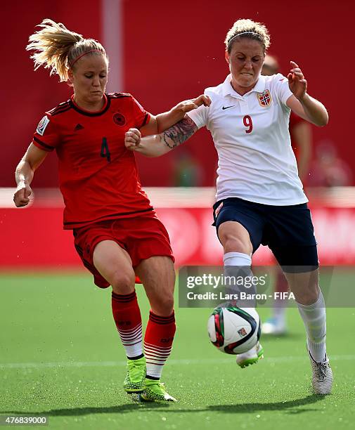 Leonie Maier of Germany challenges Isabell Herlovsen of Norway during the FIFA Women's World Cup 2015 Group B match between Germany and Norway at...