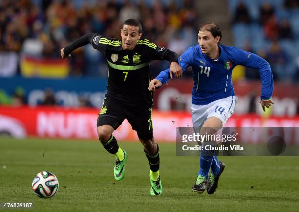 Gabriel Paletta of Italy and Thiago of Spain compete for the ball during the international friendly match between Spain and Italy at Vicente Calderon...