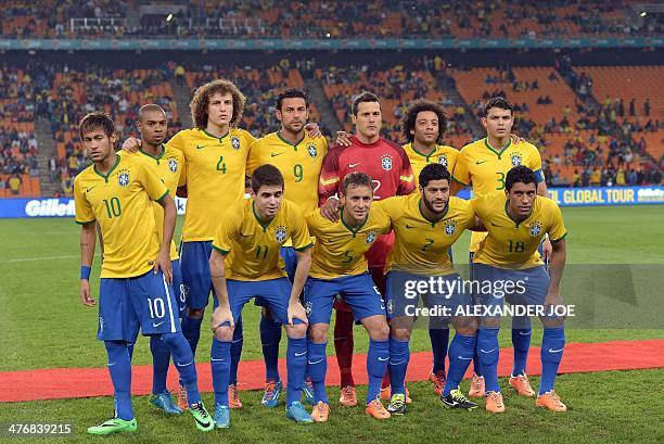 Brazil's national football team players forward Neymar, midfielder Fernandinho, defender David Luiz, forward Fred, goalkeeper Julio Cesar, defender...