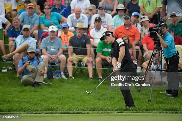 David Lingmerth plays his third shot on the 18th green during the final round of the Memorial Tournament presented by Nationwide at Muirfield Village...