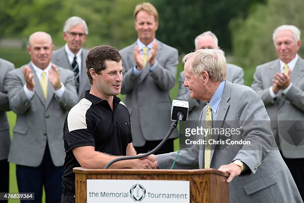 David Lingmerth waits is greeted by tournament host Jack Nicklaus after winning the Memorial Tournament presented by Nationwide at Muirfield Village...