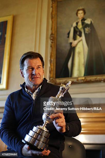 Sir Nick Faldo, golfer and three times winner of the Open Championship, with his Open Championship winner's Claret Jug, in the Big Room of the Royal...