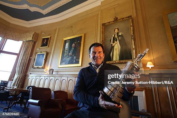 Sir Nick Faldo, golfer and three times winner of the Open Championship, with his Open Championship winner's Claret Jug, in the Big Room of the Royal...