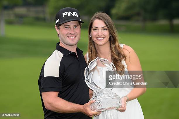 David Lingmerth and Megan Lingmerth pose with the tournament trophy after Lingmerth wins the Memorial Tournament presented by Nationwide at Muirfield...