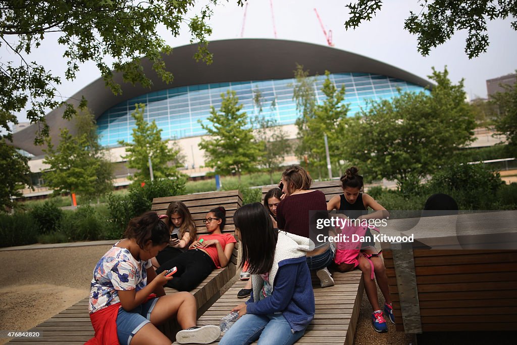 Visitors Enjoy The Warm Weather At London's Olympic Park
