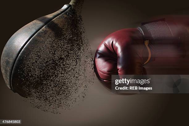 close up boxer and punch bag with blurred motion - boxboll bildbanksfoton och bilder