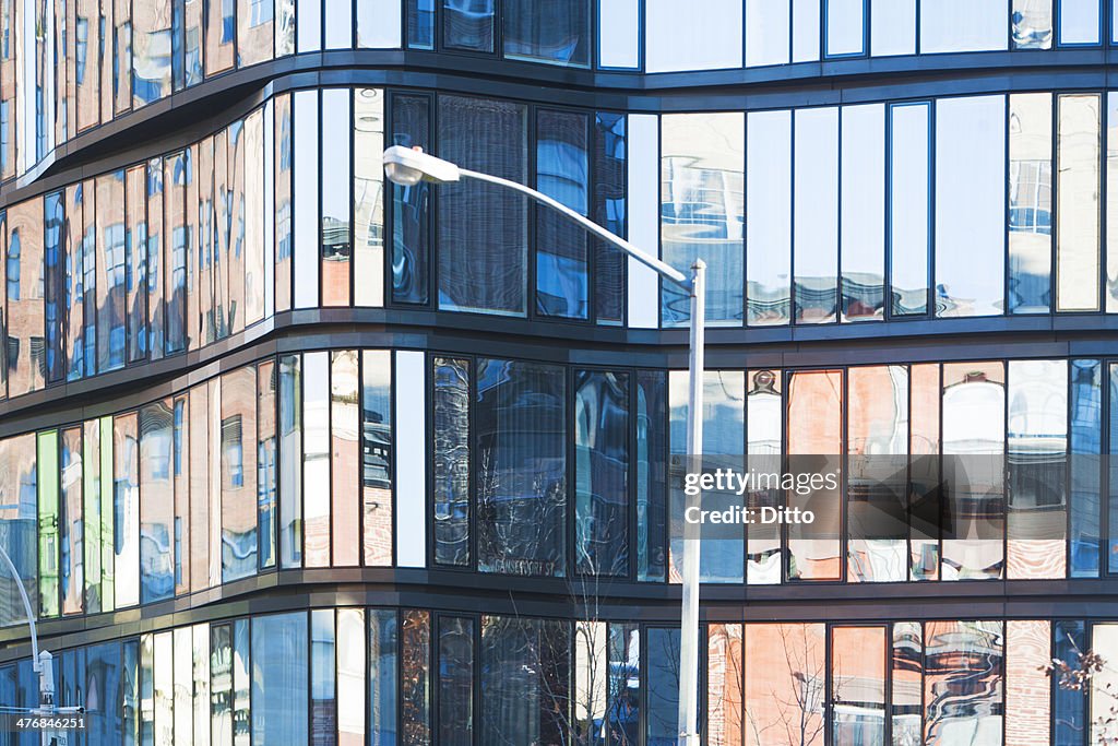 Close up of office block with glass facade, New York, USA