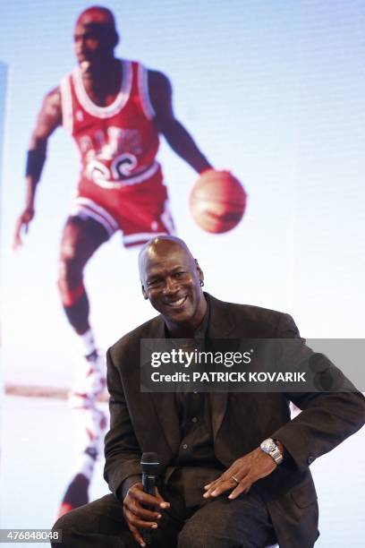 Former professional US basketball player Michael Jordan delivers a press conference at the Palais de Tokyo in Paris on June 12, 2015 to present...