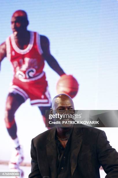 Former professional US basketball player Michael Jordan delivers a press conference at the Palais de Tokyo in Paris on June 12, 2015 to present...