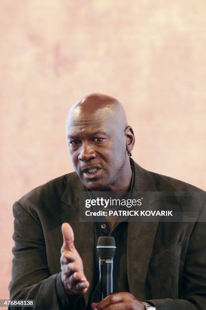 Former professional US basketball player Michael Jordan delivers a press conference at the Palais de Tokyo in Paris on June 12, 2015 to present...