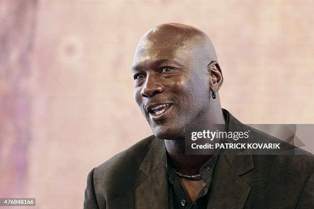 Former professional US basketball player Michael Jordan delivers a press conference at the Palais de Tokyo in Paris on June 12, 2015 to present...