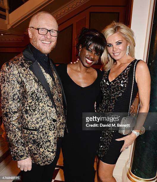 John Caudwell, June Sarpong and Claire Caudwell attend a dinner hosted by John Caudwell on March 5, 2014 in London, England.