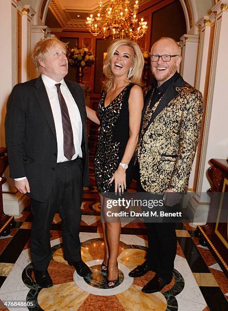 Boris Johnson, Claire Caudwell and John Caudwell attend a dinner hosted by John Caudwell on March 5, 2014 in London, England.