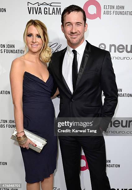 Katy O'Grady and Barry Sloane arrive for the 22nd Annual Elton John AIDS Foundation's Oscar Viewing Party held at West Hollywood Park on March 2,...