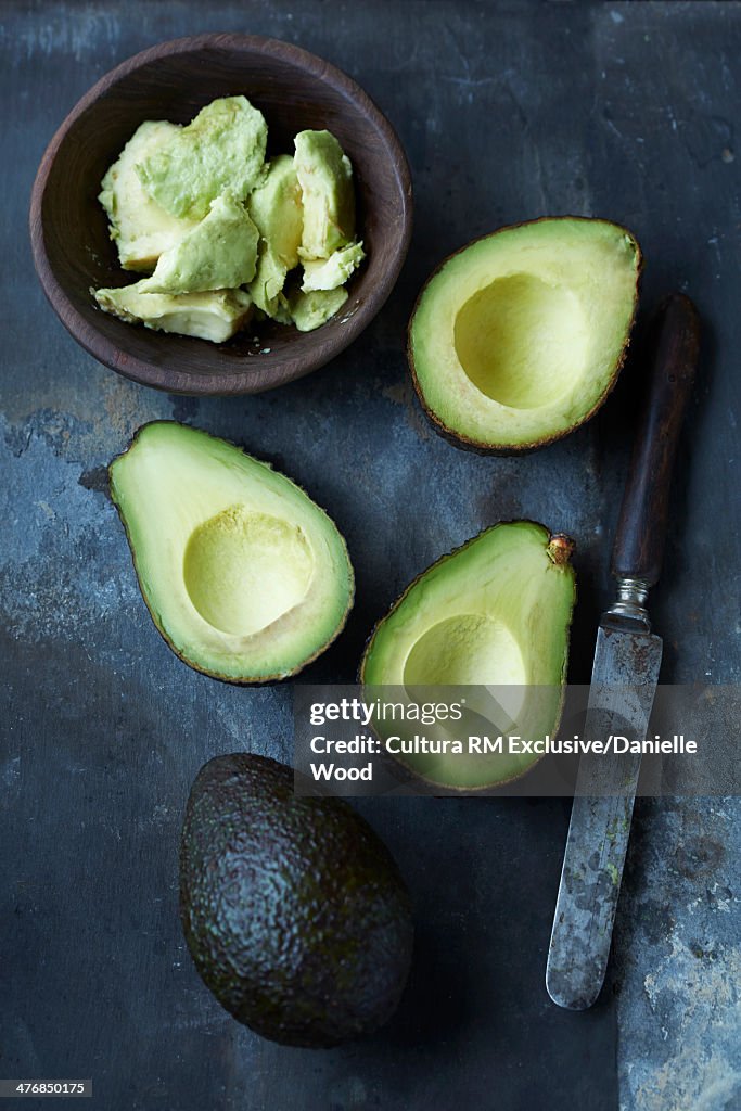 Sliced, mashed and whole avocado