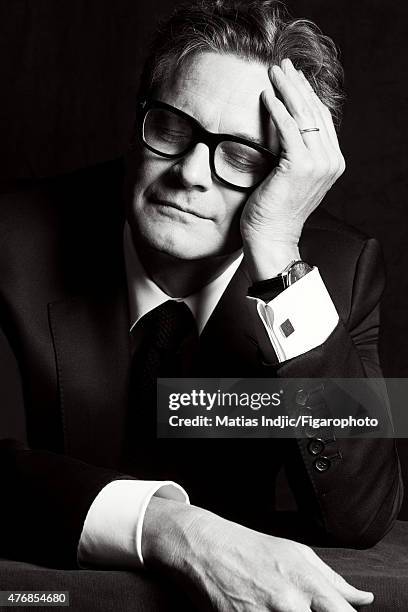 Actor Colin Firth is photographed for Madame Figaro on May 1, 2015 at the Cannes Film Festival in Cannes, France. Suit, shirt and tie , watch ....