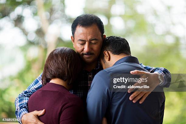 loving family - couple praying stock pictures, royalty-free photos & images