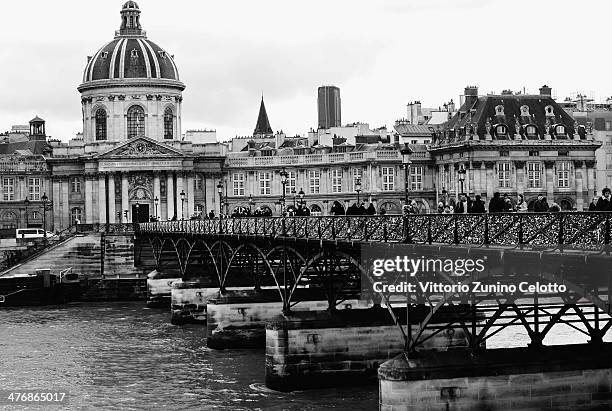 Love padlocks are attached to Le Pont des Arts on February 26, 2014 in Paris, France.