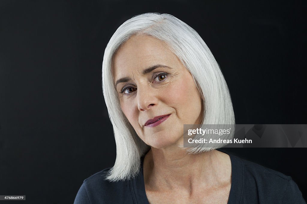 Grey haired mature woman, portrait.