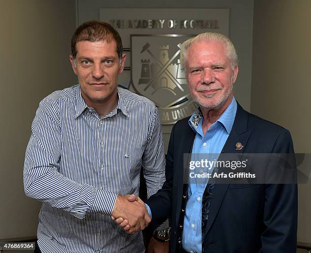 West Ham United New Manager Slaven Bilic shakes hands with West Ham Chairman David Gold at the Boleyn Ground on June 12, 2015 in London, United...